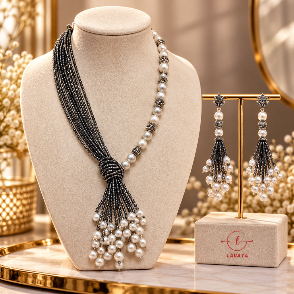 Lavaya Royal Black Beaded & Ivory Pearl Asymmetric Tassel Necklace with Matching Earrings Set