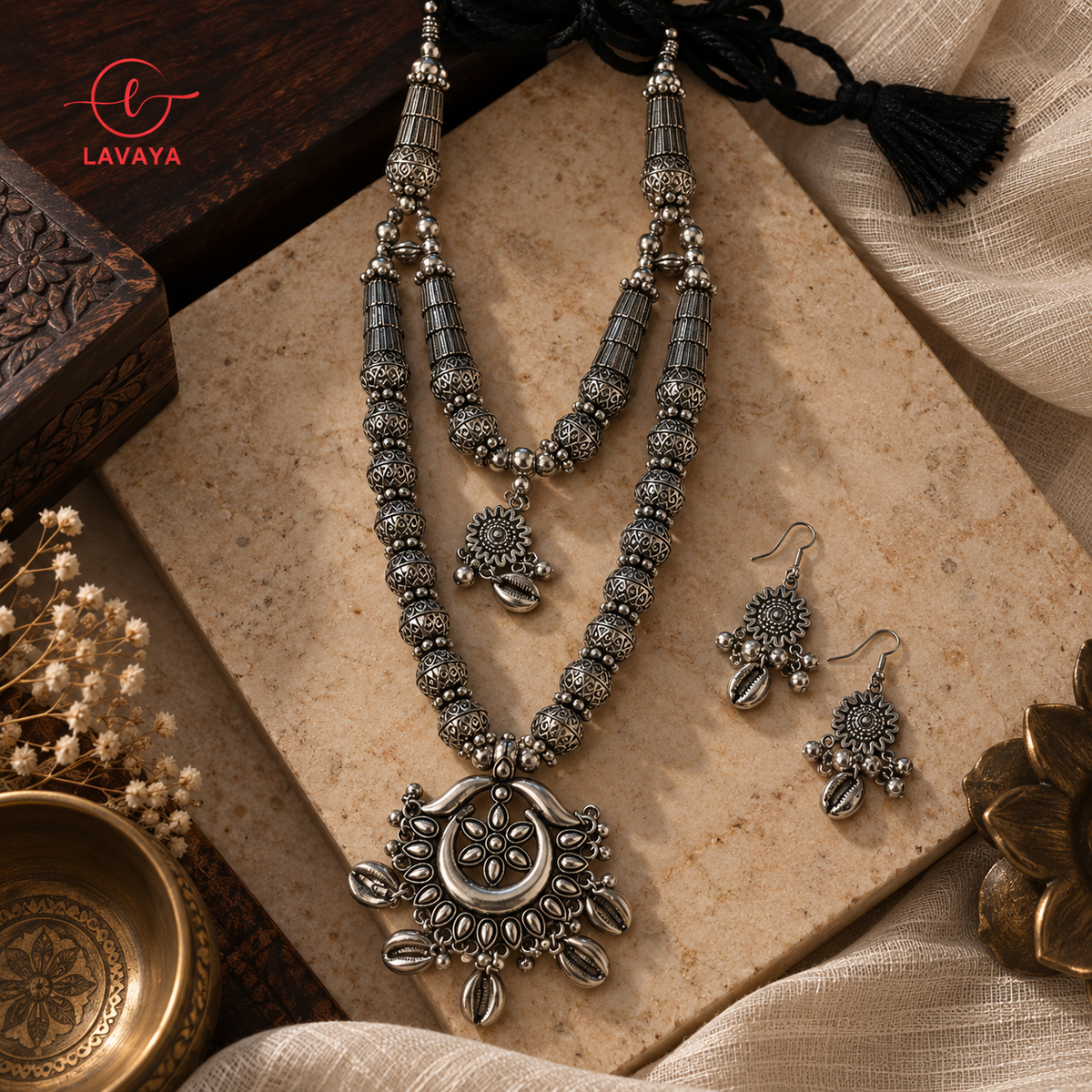 Lavaya Tribal Layered Oxidized Silver Rani Haar with Crescent Floral Medallion, Cowrie Accents & Drop Earrings