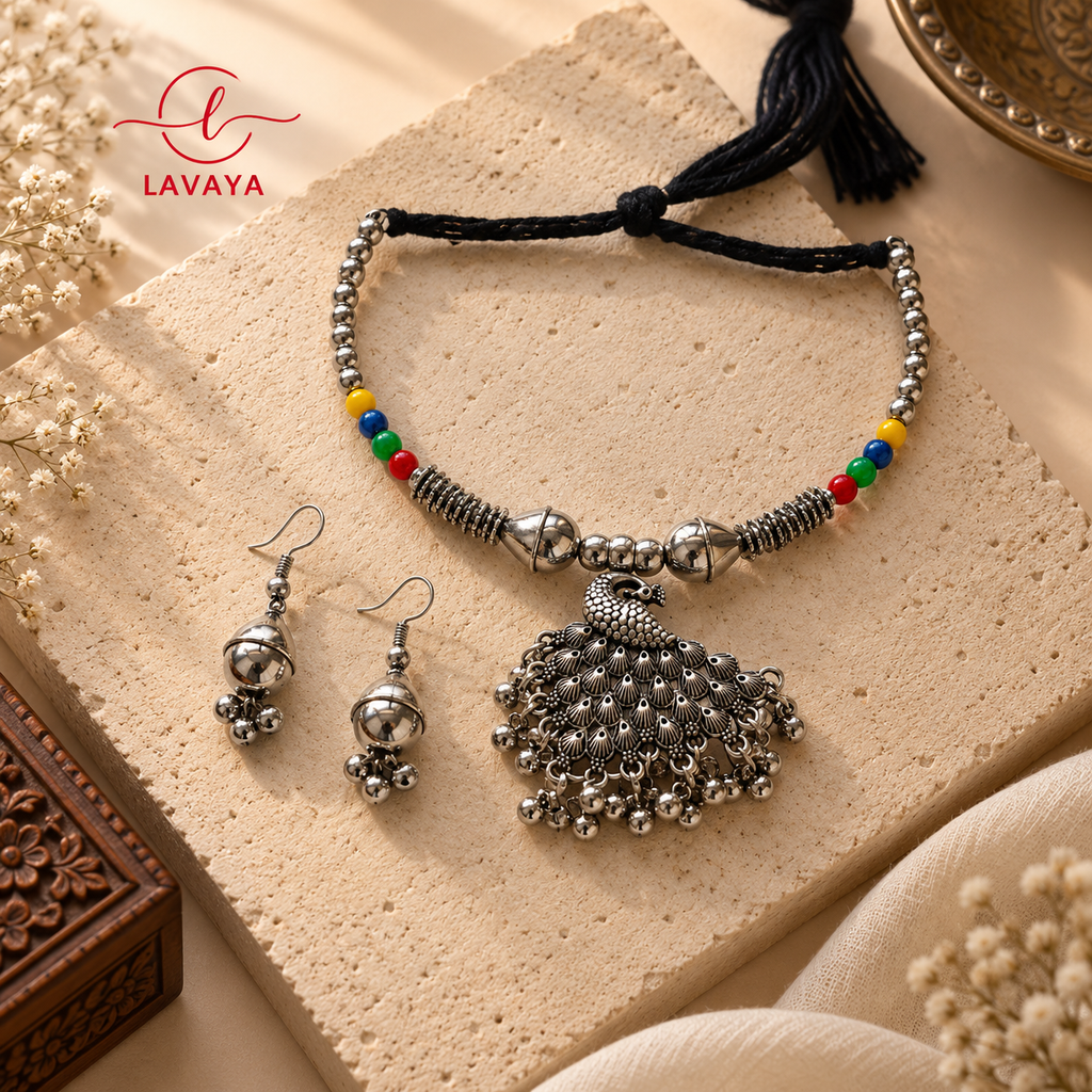 Lavaya The Mor-Pankhi: Handcrafted Oxidized Silver Peacock Medallion Necklace with Folk Bead Accents & Bell-Drop Earrings