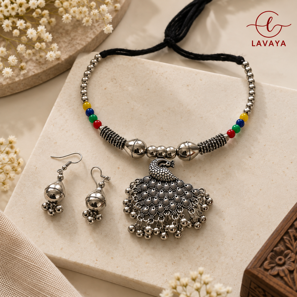 Lavaya The Mor-Chhatra: Handcrafted Oxidized Silver Peacock Medallion Necklace with Folk Bead Accents & Bell Drop Earrings