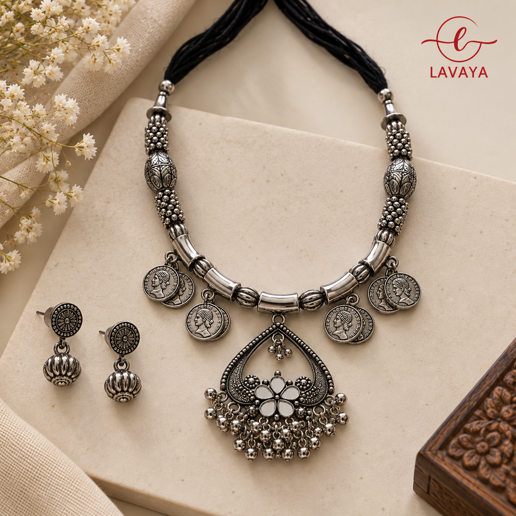 Lavaya The Aaina Chandrika: Handcrafted Oxidized Silver Peacock Arch Collar Necklace Set with Mirror-Work Flower & Bauble Drop Earrings