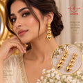 Lavaya Cascading Puffy Heart Tiered Gold Statement Drop Earrings