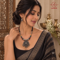 Lavaya The Rang-Riti: Handcrafted Oxidized Silver Floral Mandala Necklace with Colorful Folk Bead Accents & Bell-Drop Earrings