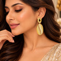 Lavaya Premium Gold-Tone Textured Oval Drop Earrings for Women – Elegant Statement Jewellery with Polished Open Oval Stud & Artistic Ribbed Design.  NP PRICE